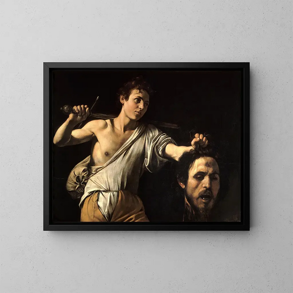 David med Goliaths huvud - Le Caravage — inramlat konstverk på väggen