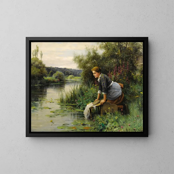 Laveuse vid vattnet - Daniel Ridgway Knight — inramlat konstverk på väggen