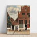 Reproduktion av målningen La ruelle de Johannes Vermeer