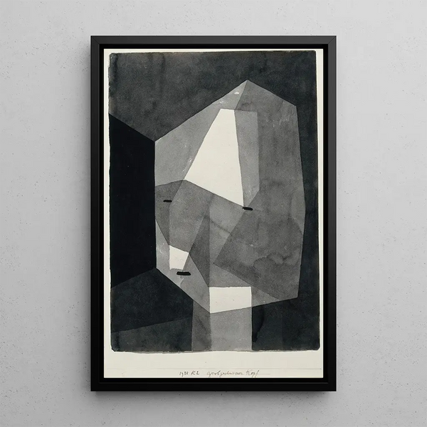 Tête grossièrement taillée - Paul Klee — inramlat konstverk på väggen