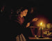 En marknadsscen vid ljuset av ljus - Petrus van Schendel — vy av konstverket