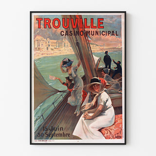 Vintage Normandie-affisch – Trouville, Casino municipal, uppsatt i en tunn ram på en ljus vägg.