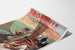 Vintageaffisch Normandie – Trouville, municipalcasino, visad på lätt böjd pappersyta i perspektiv.