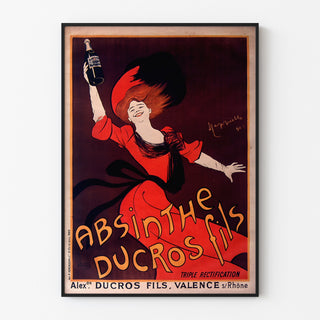 Vintage reklamaffisch Absinthe Ducros, i tunn ram på en ljus vägg.