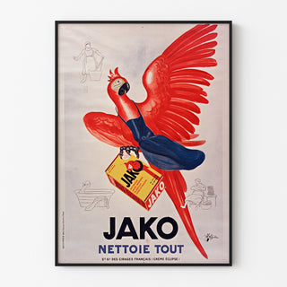Vintage reklamaffisch Jako nettoie tout, i tunn ram på en ljus vägg.