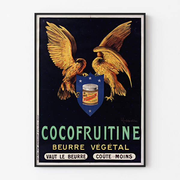 Vintageaffisch Cocofruitine, vegetabiliskt smör, i tunn ram på en ljus vägg.