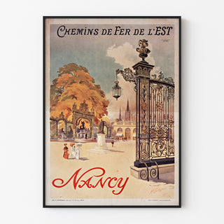 Vintageaffisch Nancy, chemins de fer de l’Est, i en tunn ram på en ljus vägg.