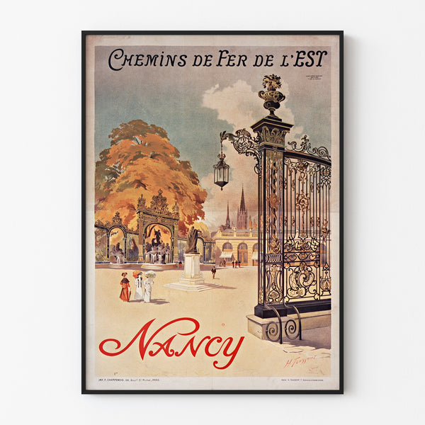 Vintageaffisch Nancy, chemins de fer de l’Est, i en tunn ram på en ljus vägg.