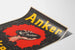 Vintageposter Anker Brikets huvudmotiv en kol
