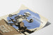 Vintageposter Private Scrap Builds a Bomber - Industriell väggdekoration