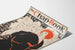 Vintageposter med elegant grafisk design av The Chap-Book